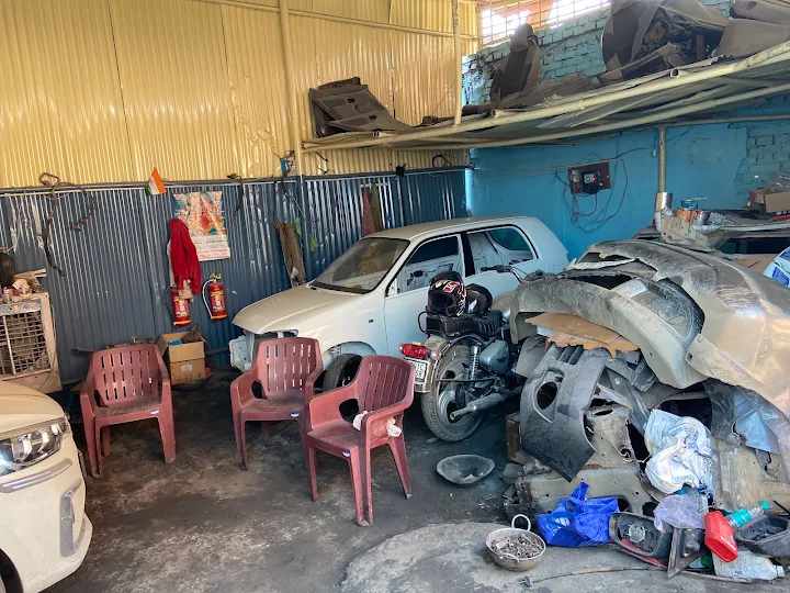Workshop interior with cars under repair